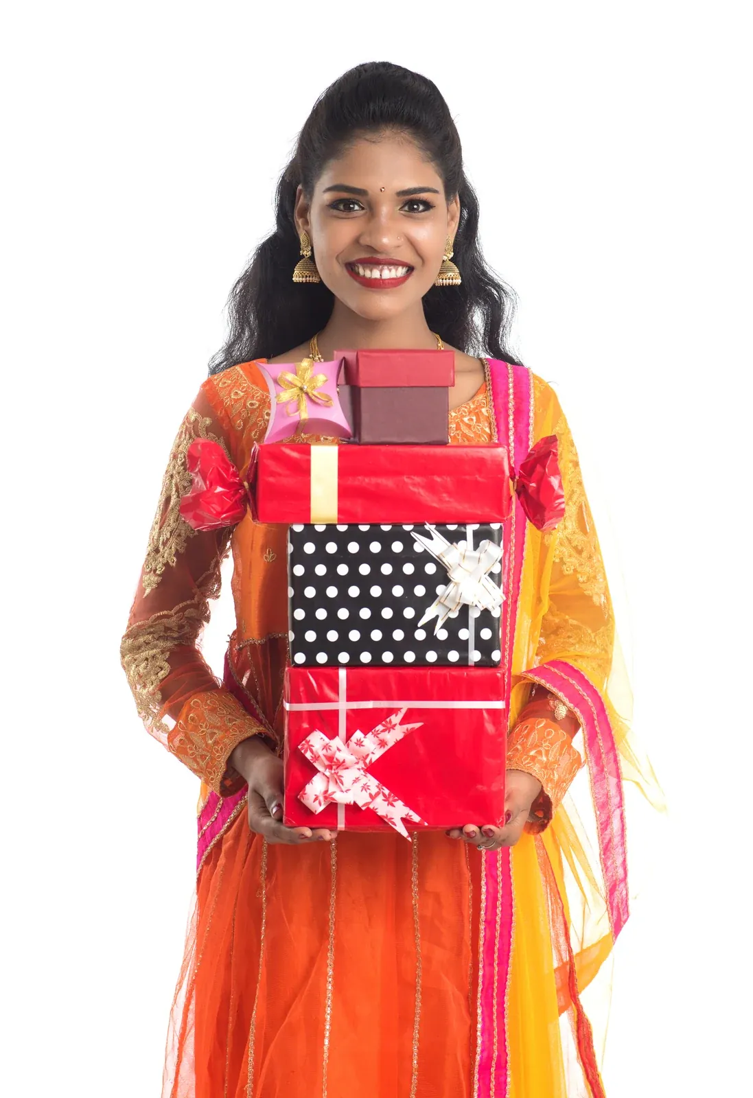 Woman holding a stack of wrapped gifts