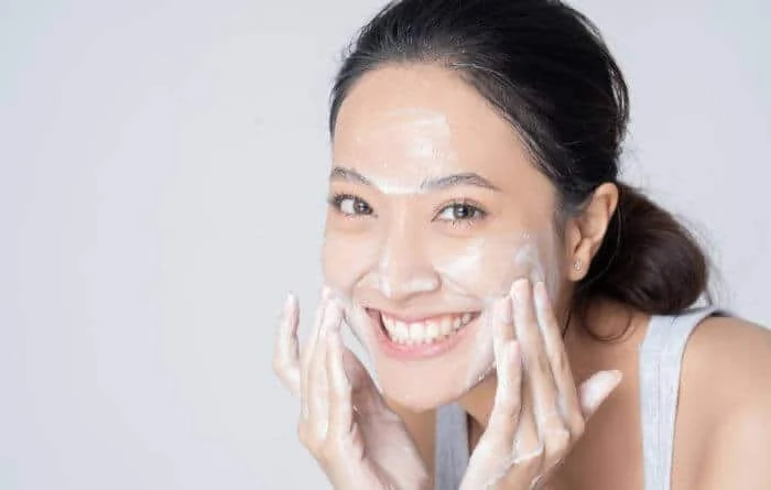 Exfoliate your skin to get a glow on your face
